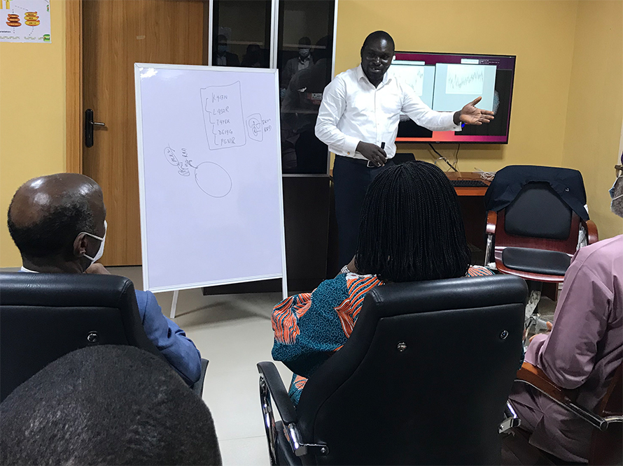 Omotuyi, who says he finds teaching "an absolute joy," instructs interns at Afe Babaloa University on the analysis of molecular dynamics simulation.