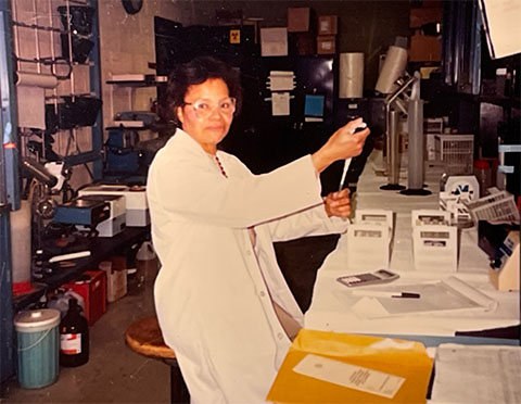 Elvira Doman works at the bench in George Carman’s laboratory during her 1989 sabbatical at Rutgers.