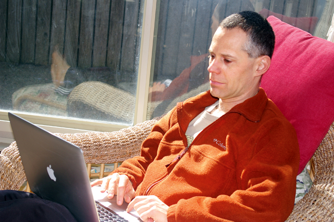 Steve Caplan at his laptop