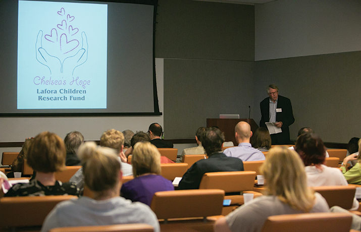 Biochemist Jack Dixon gives a talk at the Lafora disease meeting.