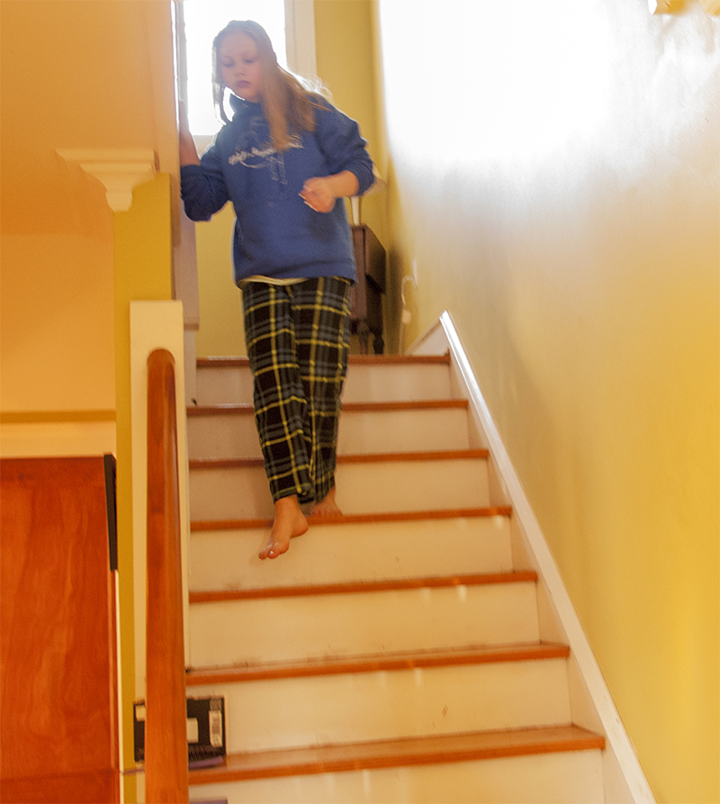 Lizzie makes her way down the stairs