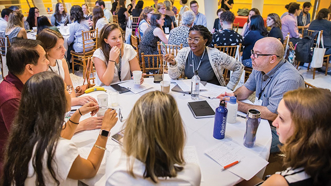 Lively discussion during a group work session at the SciOut18 meeting