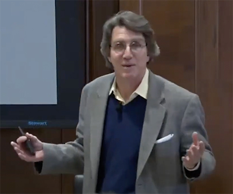 Ed Eisenstein interacts with the public at a scientific café in 2019.
