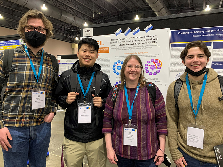Rebecca Roberts (second from right) and Ursinis College students Michael Landis, Tyler Chin and John Doherty attended the 2022 ASBMB meeting in Philadelphia.