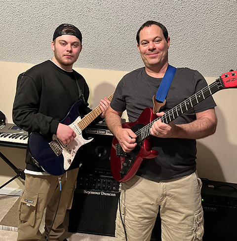 When he’s not in the lab, Brian Strahl likes to unwind by playing the guitar. He sometimes jams with his son, Kyle.