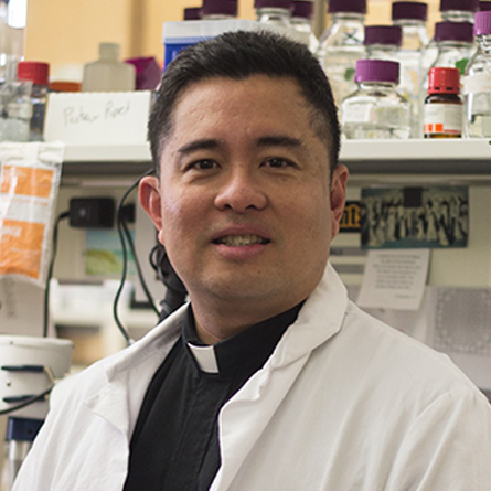 Nicanor Austriaco, a scientific researcher and a Catholic priest, teaches both biology and theology at Providence College in Rhode Island.