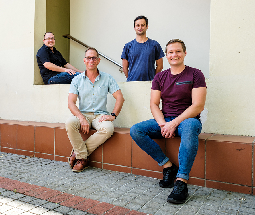 Erick Strauss, second from left, and the three researchers who worked on the Synchrotron Techniques for African Research and Technology/Africa Grand Challenge.