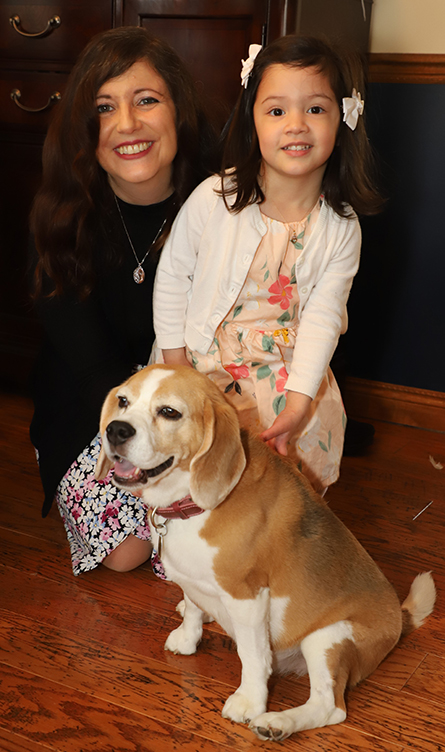 Danielle Guarracino, her 3-year-old daughter Julia and her 7-year-old beagle Tobie pose for a Mother’s Day portrait.