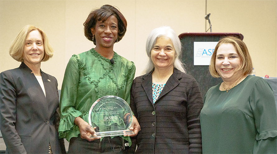 Ann Stock, left, with Tracy Johnson, outgoing ASBMB President Toni Antalis and Sonia Flores, chair of the Maximizing Access Committee at the 2022 ASBMB annual meeting, where Johnson received the society’s Ruth Kirschstein Diversity in Science Award.