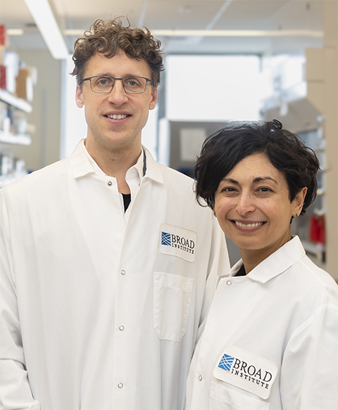 Eric Minikel and Sonia Vallabh pose for a photo in their lab at the Broad Institute.