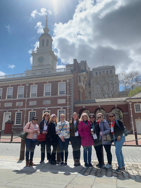 Members of the ASBMB Women in Biochemistry and Molecular Biology Committee pause to pose in front of Independence Hall during their walk at the 2022 annual meeting in Philadelphia.