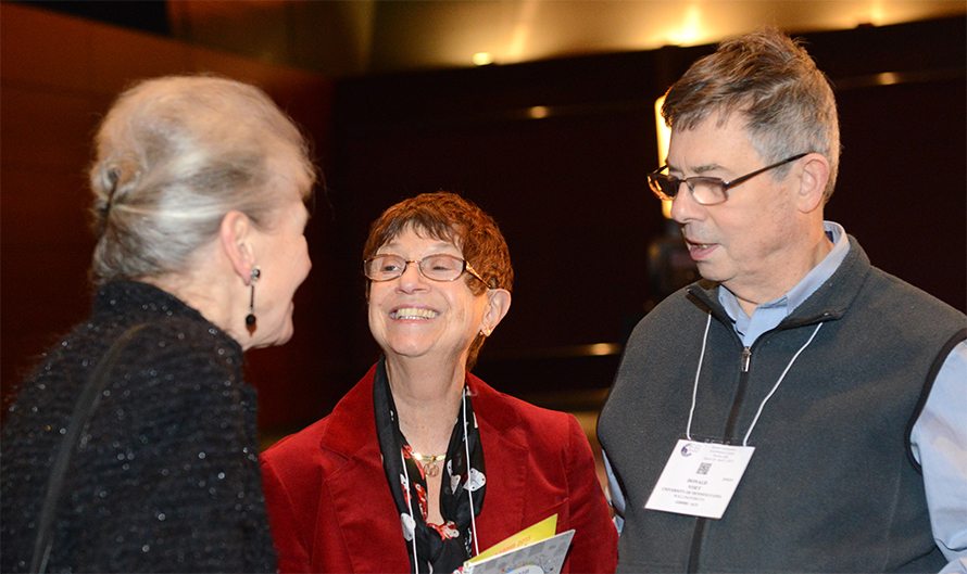 Judy and Don Voet talk to Joan Steitz of Yale University at the 2015 ASBMB annual meeting.