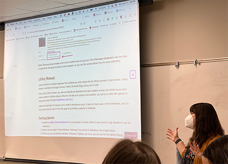 Alyssa Young explains to biochemistry lab students how to use library resources to gain access to scientific literature.