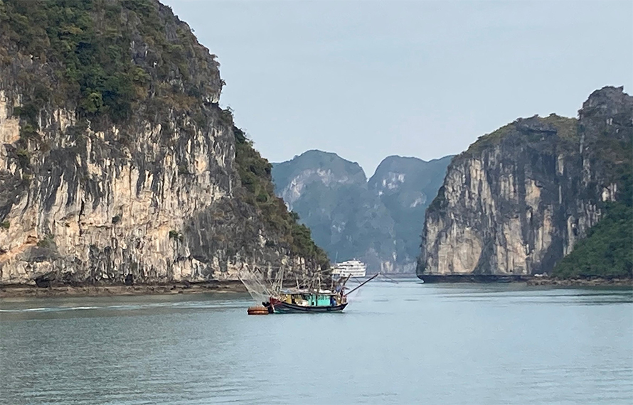 While in northeast Vietnam, Blaise and Kathryn Arena visited Hą Long Bay, which features towering limestone islands that are crested with tropical rainforests.