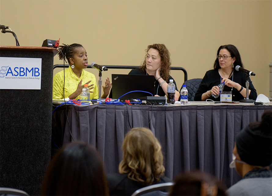 Batsirai Bvunzawabaya, left, speaks during a session on race and mental health at the 2022 ASBMB annual meeting in Philadelphia. Also on the panel were Cirleen DeBlaere (center), associate professor and coordinator of the counseling psychology doctoral program at Georgia State University, and Carlota Ocampo (right), provost, vice president of academic affairs and associate professor of psychology at Trinity Washington University.