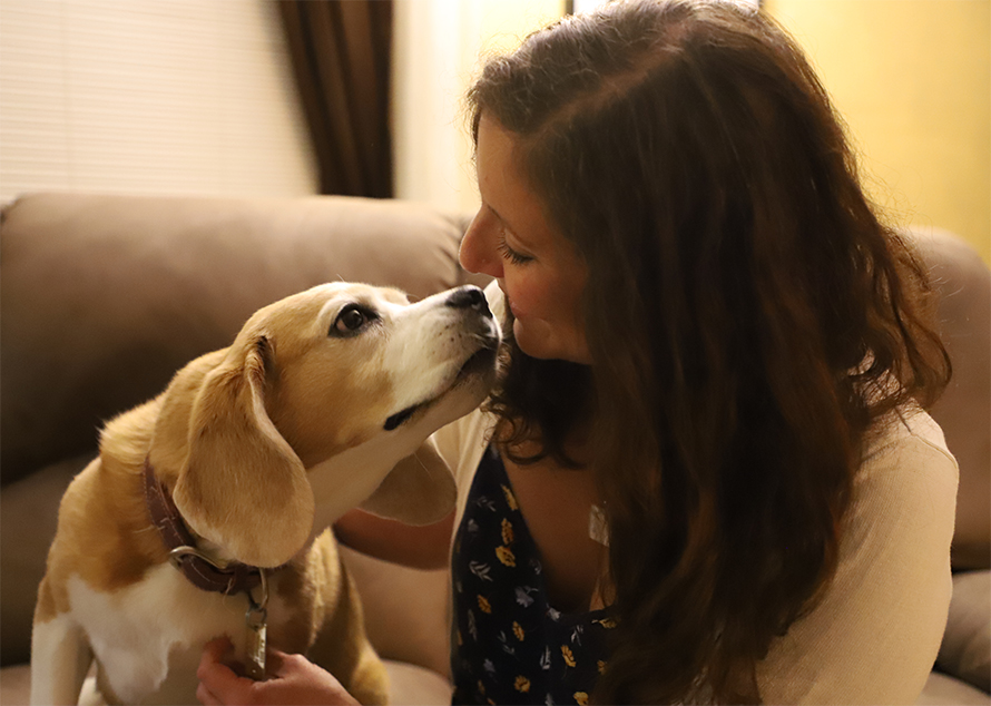The author and her beagle, Tobie, demonstrate the mutual loving gaze that may trigger an oxytocin-mediated positive loop.