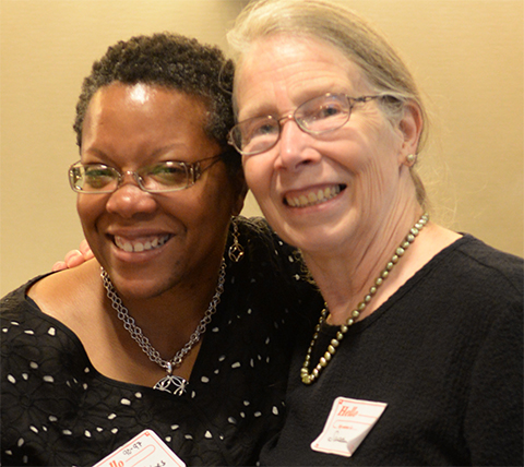 Margaret Kanipes, left, pursued her Ph.D. in biological sciences in the lab of Susan Henry, right, at Carnegie Mellon University, where she moved from chemistry to molecular biology.