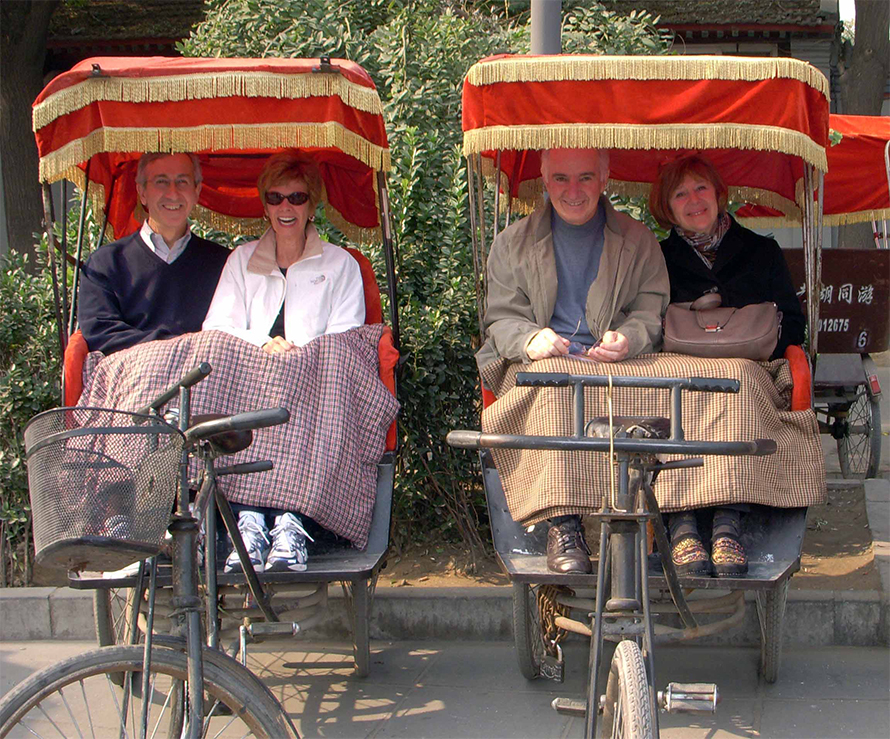 While attending the 2007 Chinese Academy of Science Symposium “Ubiquitin and Protein Degradation” in honor of Fred Goldberg’s 65th birthday in Beijing, the DeMartinos and the Goldbergs enjoyed a pedicab ride. Pictured, from left to right, are George and Kathy DeMartino and Fred and Joan Goldberg.