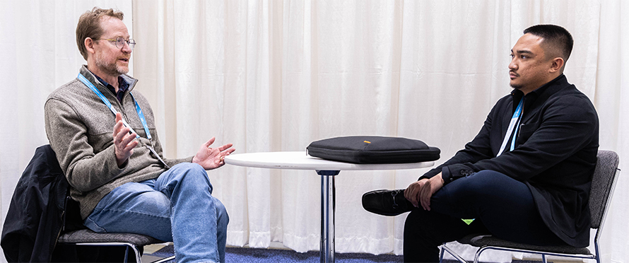 Chris Heinen (left), a professor at the University of Connecticut School of Medicine and a member of the ASBMB Education and Professional Development Committee, has a one-onone mentoring session with Kyle Magro, a student in the Postbaccalaureate Research Education Program at the University of California, at Discover BMB 2023 in Seattle.