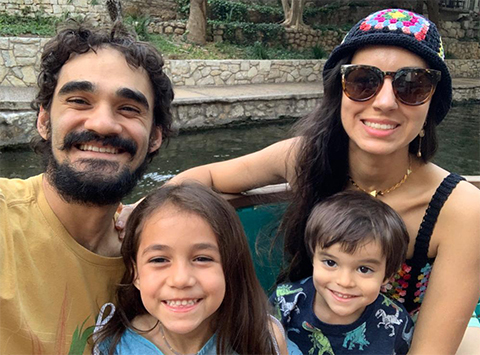 Thiago Pasin and his family take a boat tour of the San Antonio River at the city’s River Walk.