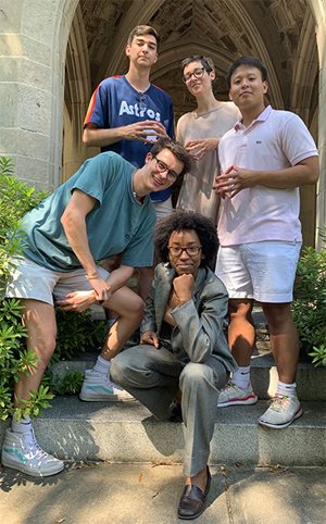 Shana Stoddard and members of her research team gather on the steps of their building at Rhodes College.